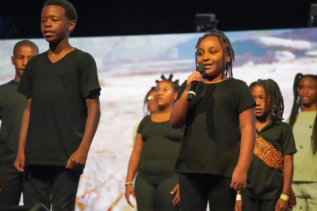 Children performing on stage